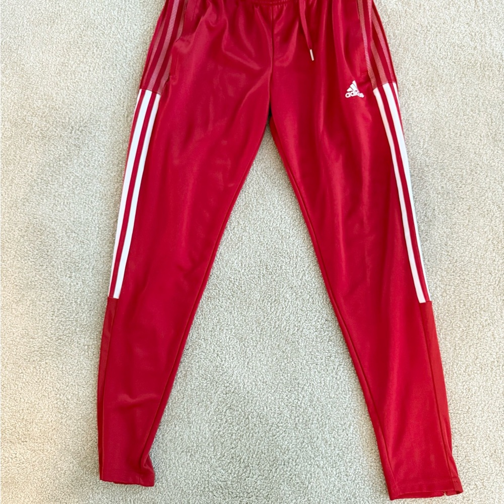 Adidas womens Red Joggers with White Stripes.  Size small